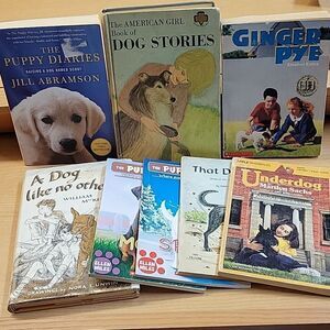 8 paperback books about dogs